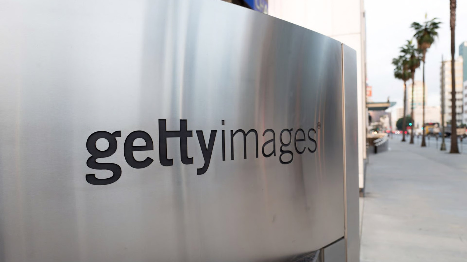 Getty Images and Shutterstock corporate logos side by side representing the terminated stock photo merger