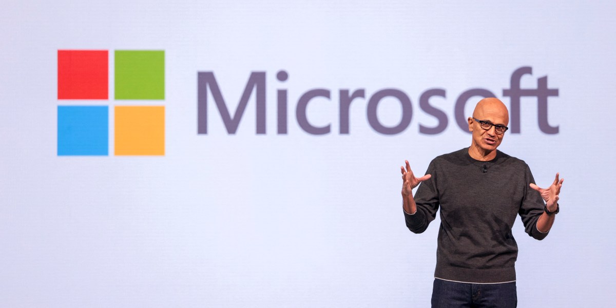 Microsoft engineers working alongside enterprise client staff on AI systems inside a corporate office