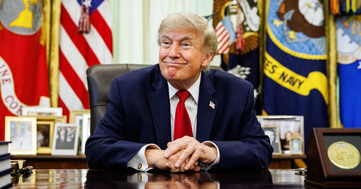 President Donald Trump at his desk in the Oval Office. Source: CBS News